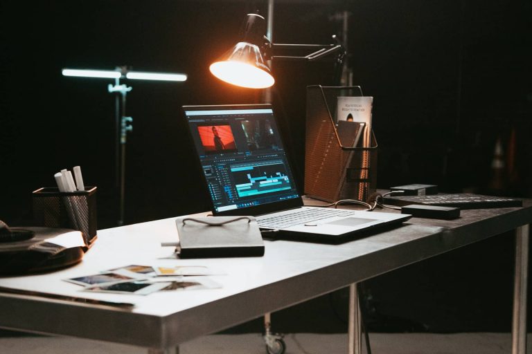 Laptop with Premiere Pro on Desk